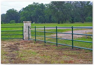 Rail pipe fence with stone corner post