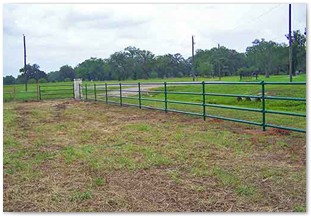 Rail pipe fence with stone corner post (2)