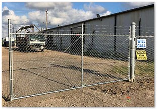 Six foot commercial grade galvanized gate plus one foot of barbwire