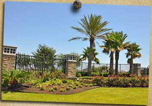 Whispering Lakes wrought iron with stone columns