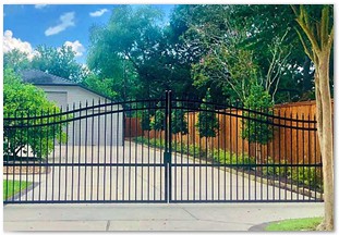 7ft Capped western red cedar fence (stained), 5ft wrought iron fence and double drive wrought iron gate with arch